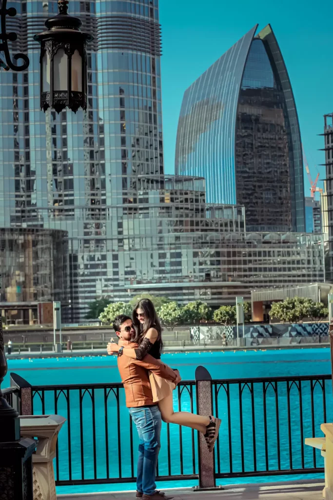 Bride and groom embracing near Burj Khalifa