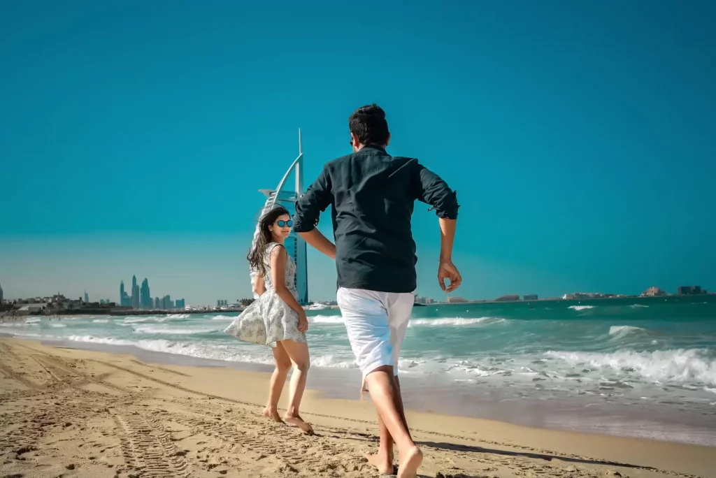 Couple embracing on Jumeirah Beach, Dubai