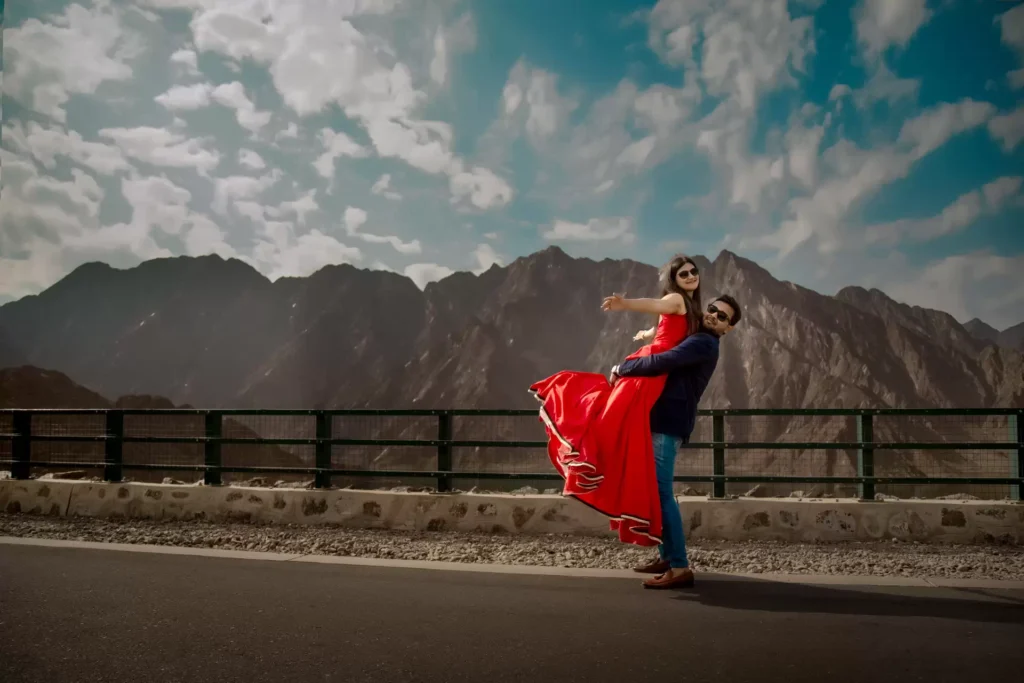 Couple exploring Hatta Dam during pre-wedding photoshoot