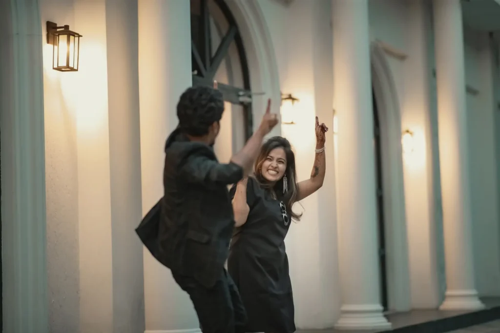 Bride and groom dancing at sunset