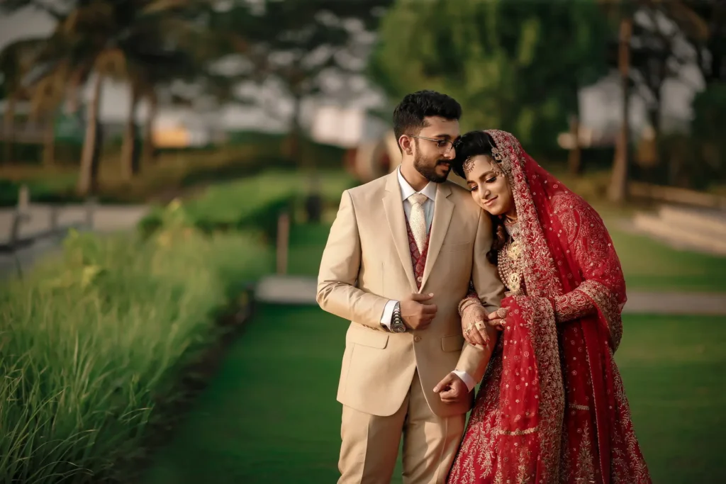 Couple embracing during sunset at Grand Hyatt Kochi