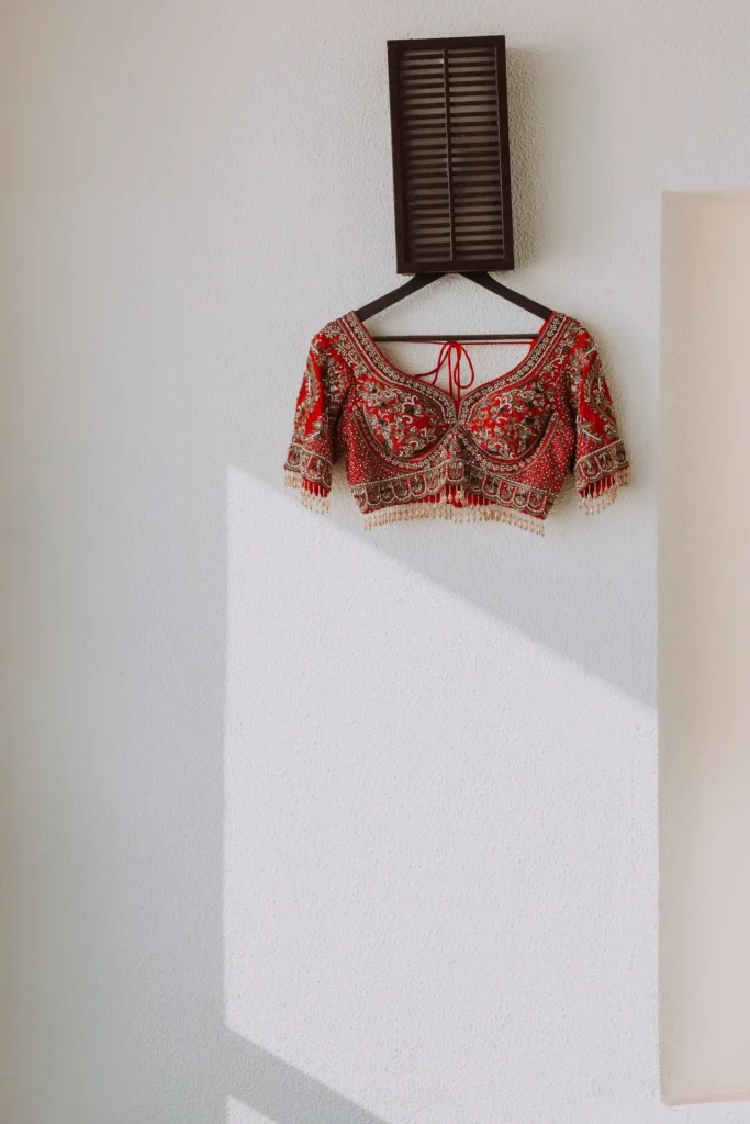 close up of red bridal blouse.