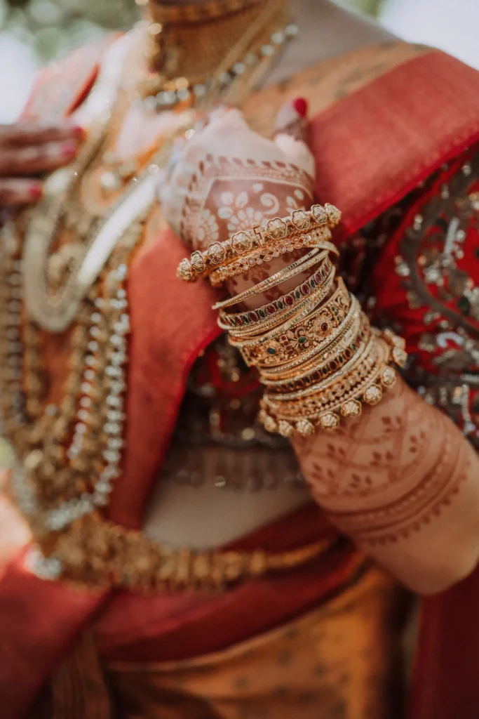 Traditional Indian bridal jewelry at Kerala wedding leela kovalam