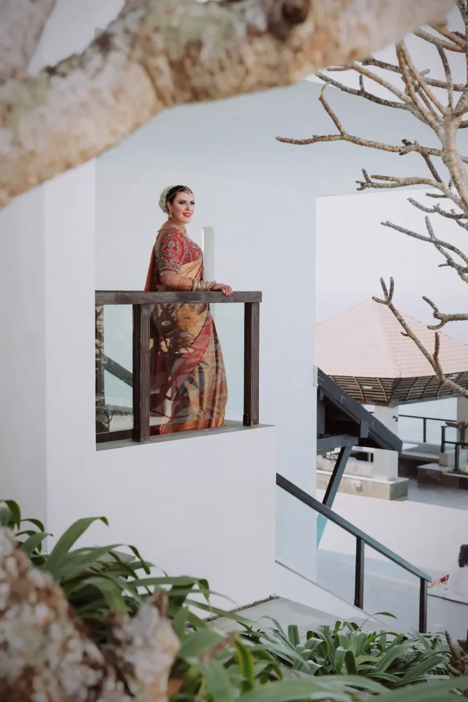 Bridal portrait in traditional South Indian saree at leela kovalam