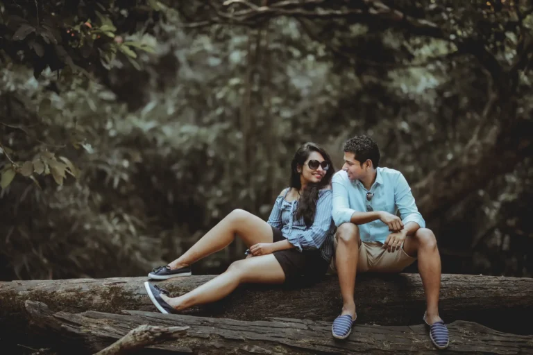 Couple posing on Ponmudi Hill Station during post-wedding photoshoot