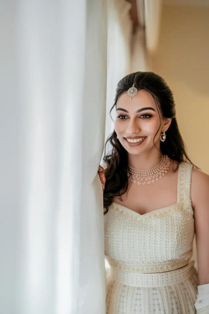 Bride in traditional wedding attire preparing for Trivandrum ceremony