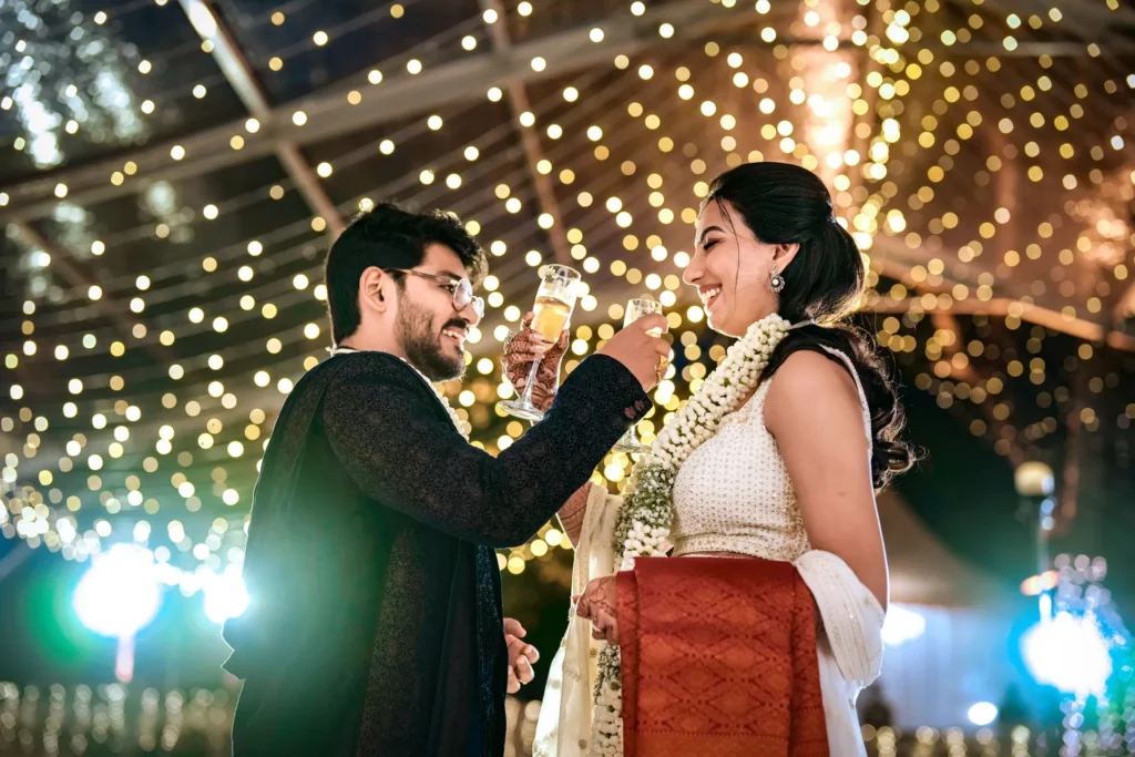 joyful candid shot of bride and groom at a Trivandrum wedding reception